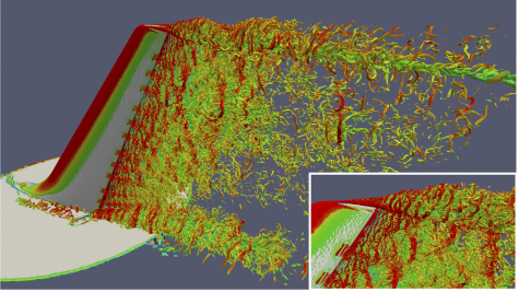 Isosurface of instantaneous Q criterion colored by speed over a vertical tail